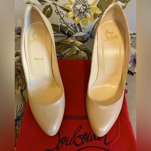 Louboutin nude pumps- red bottoms
